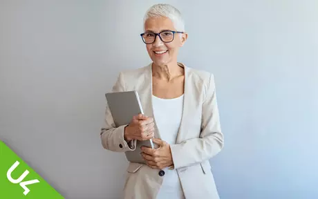 Woman, smiling and holding laptop