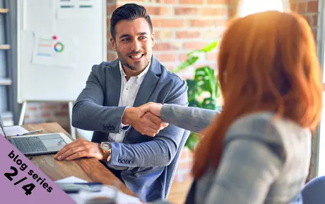 business men and woman shaking hands