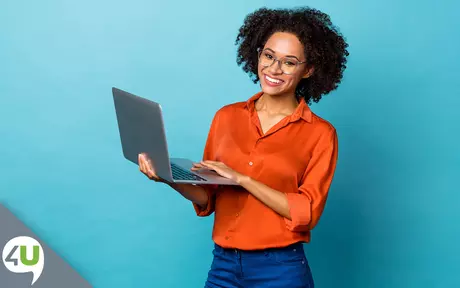 Smiling woman with laptop