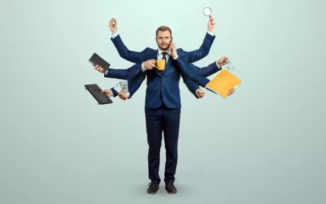 man in suit with 10 arms, holding mug, phone, money, lightbulb, magnifying glass, keyboard, notebook, glasses pen, folder