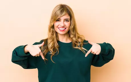 woman pointing down