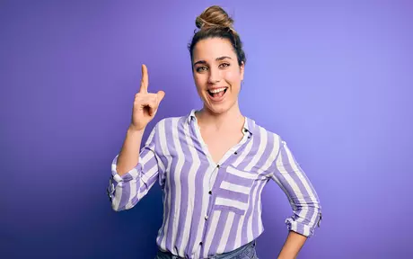woman pointing up
