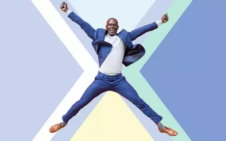 men jumping with his legs and arms open