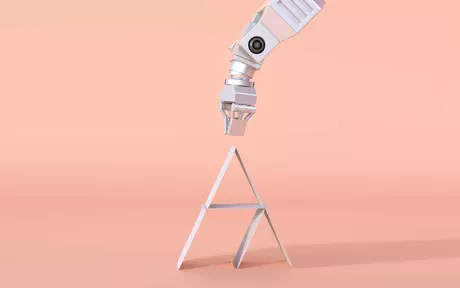 Robot arm trying to pick up an A