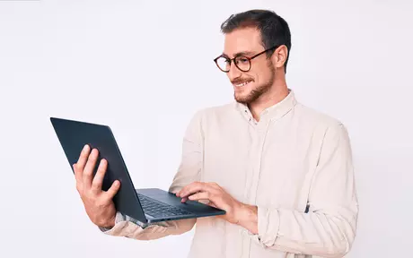 man with a laptop