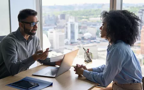 woman and men talking