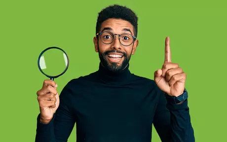 man with a loupe