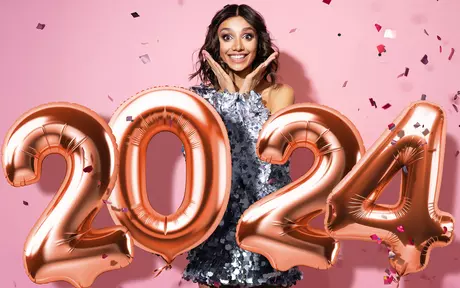 woman celebrating 2024 nye