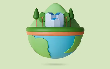 A colorful globe with a house, trees, and mountains on top, showing a cartoonish landscape.