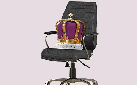 A modern office chair with a royal crown on top, featuring purple and gold colors